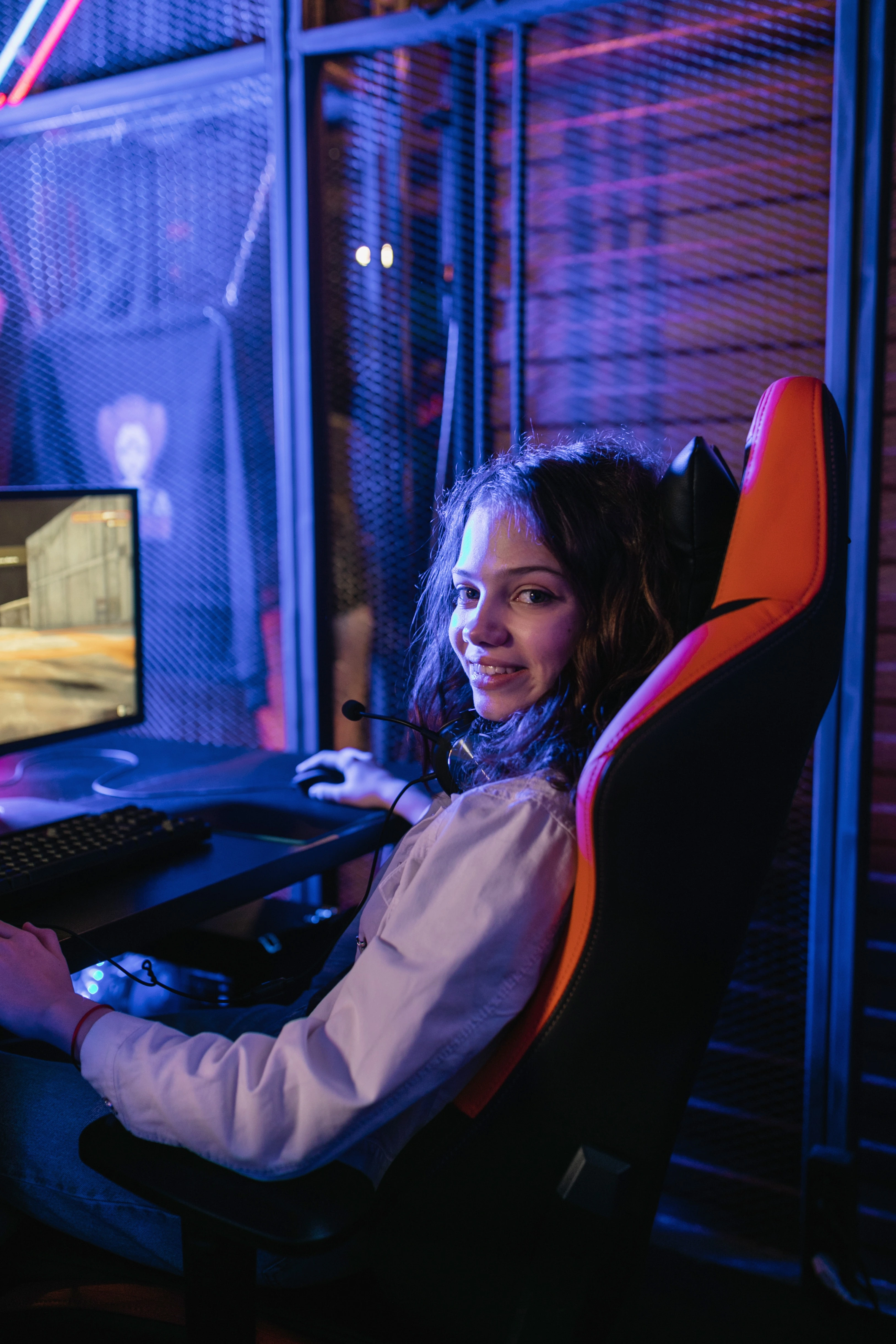 Female sitting on gaming chair